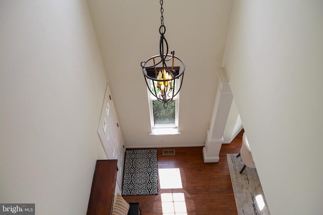 2725 Shelburne Rd, Downingtown, PA 19335 - entryway featuring visible vents, baseboards, a towering ceiling, and wood finished floors