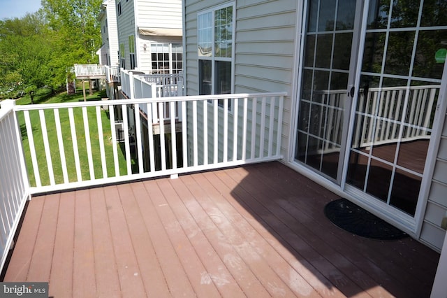 2725 Shelburne Rd, Downingtown, PA 19335 - wooden deck featuring a lawn