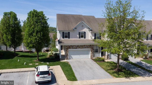2725 Shelburne Rd, Downingtown, PA 19335 - view of front of house with a garage, a front lawn, aphalt driveway, stone siding, and a shingled roof