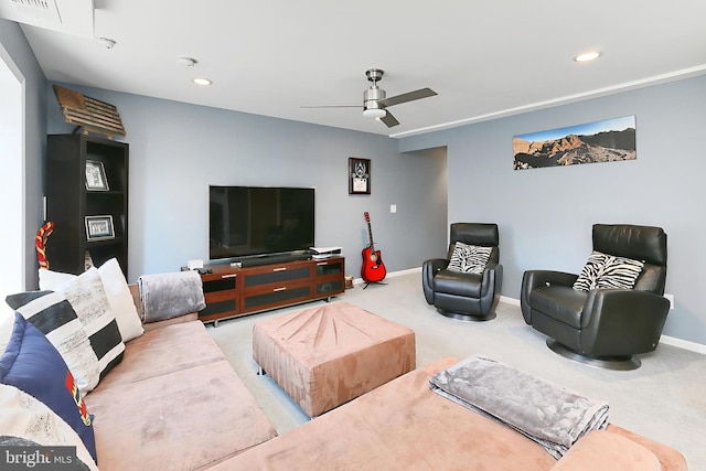 carpeted living area featuring recessed lighting, baseboards, and ceiling fan