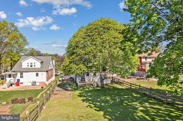 view of yard featuring a fenced backyard and a patio area
