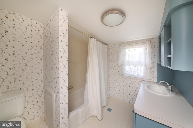 bathroom featuring toilet, wallpapered walls, tile patterned floors, and vanity