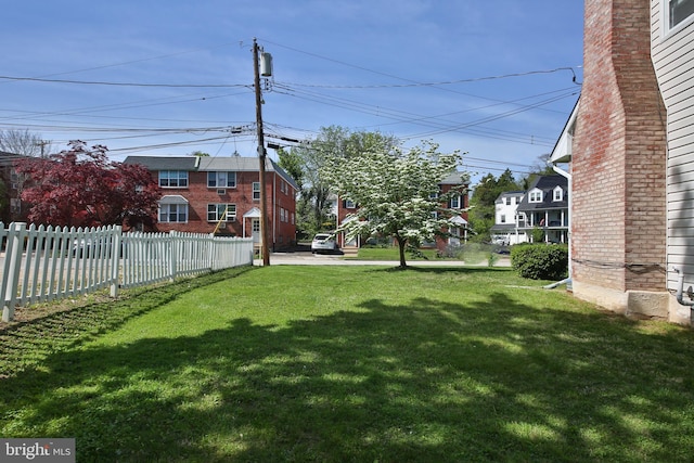 view of yard featuring fence