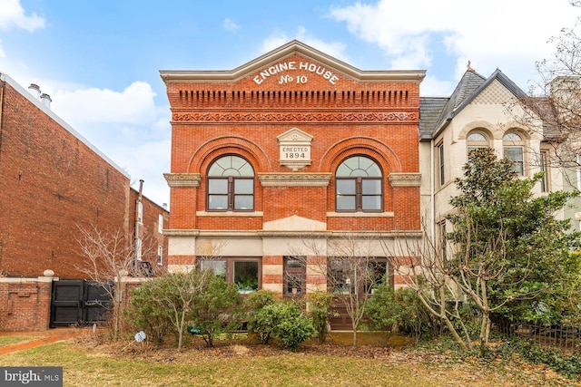 1341 Maryland Ave NE Unit 103, Washington, DC 20002 - view of front of house with brick siding and fence