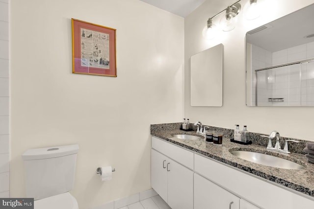 1341 Maryland Ave NE Unit 103, Washington, DC 20002 - full bathroom featuring toilet, a sink, double vanity, and tiled shower