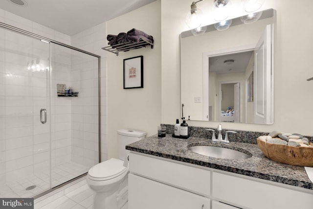 1341 Maryland Ave NE Unit 103, Washington, DC 20002 - full bath featuring tile patterned flooring, a shower stall, toilet, and vanity