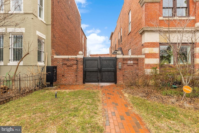 1341 Maryland Ave NE Unit 103, Washington, DC 20002 - view of gate featuring fence