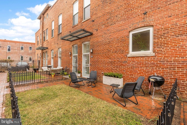 1341 Maryland Ave NE Unit 103, Washington, DC 20002 - view of yard featuring a patio area and fence