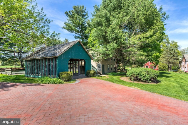 view of outbuilding featuring french doors