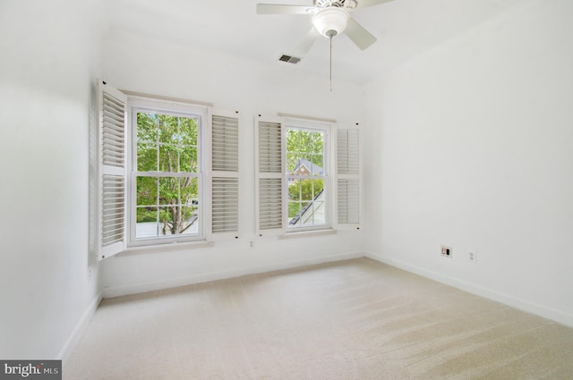 7820 Elsinore Dr, Manassas, VA 20112 - unfurnished room featuring a healthy amount of sunlight, baseboards, carpet flooring, and visible vents