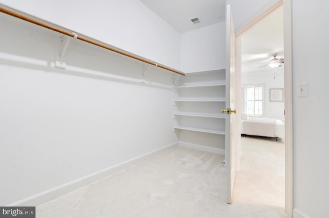7820 Elsinore Dr, Manassas, VA 20112 - walk in closet with visible vents, carpet, and ceiling fan
