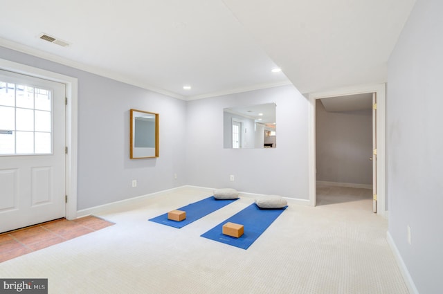 7820 Elsinore Dr, Manassas, VA 20112 - exercise area featuring crown molding, baseboards, visible vents, and carpet