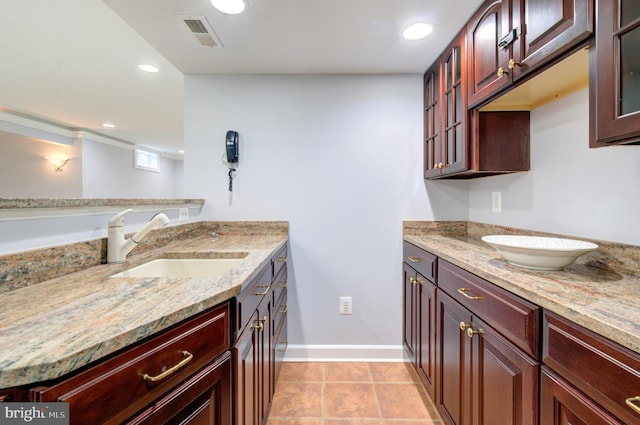 7820 Elsinore Dr, Manassas, VA 20112 - bathroom featuring tile patterned flooring, visible vents, recessed lighting, two vanities, and a sink
