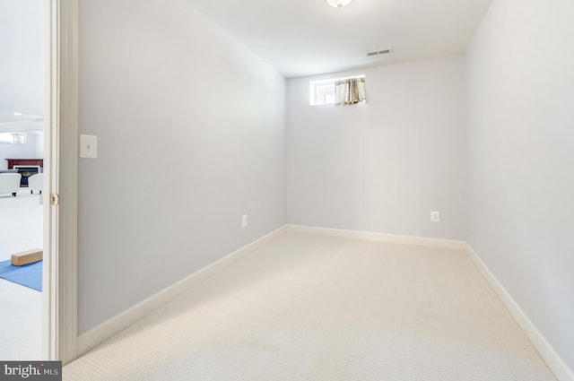 7820 Elsinore Dr, Manassas, VA 20112 - basement with visible vents, baseboards, and light colored carpet