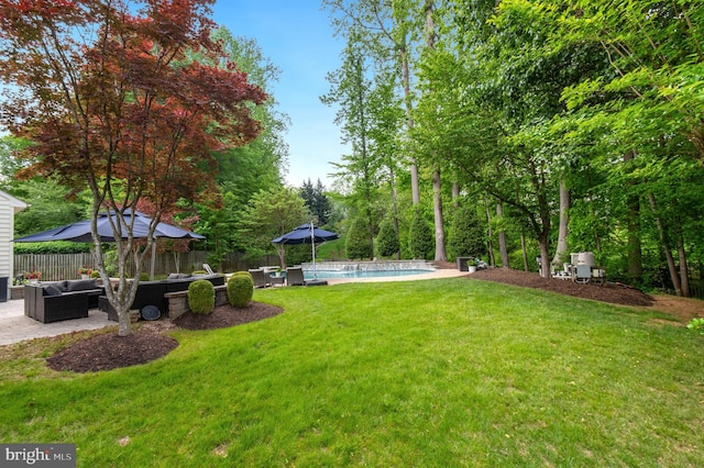 7820 Elsinore Dr, Manassas, VA 20112 - view of yard featuring an outdoor hangout area, fence, a patio, and an outdoor pool
