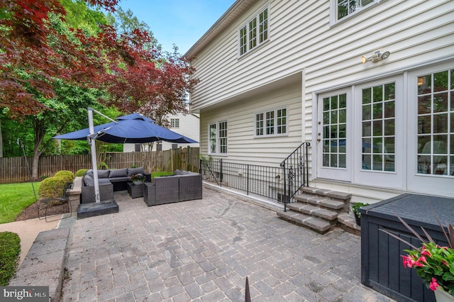 7820 Elsinore Dr, Manassas, VA 20112 - view of patio with fence, an outdoor hangout area, and entry steps