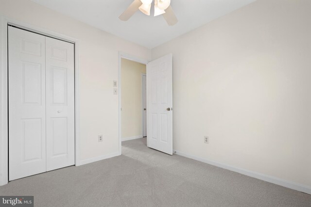 6915 Compton Valley Ct, Centreville, VA 20121 - unfurnished bedroom featuring baseboards, a ceiling fan, carpet flooring, and a closet