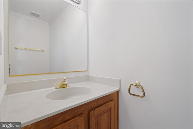 6915 Compton Valley Ct, Centreville, VA 20121 - bathroom featuring visible vents, vanity, and ornamental molding