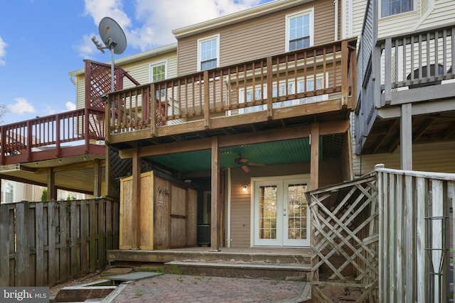 6915 Compton Valley Ct, Centreville, VA 20121 - back of property with fence, a wooden deck, a ceiling fan, and french doors