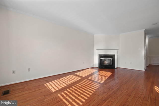 6915 Compton Valley Ct, Centreville, VA 20121 - unfurnished living room with hardwood / wood-style floors, visible vents, and crown molding