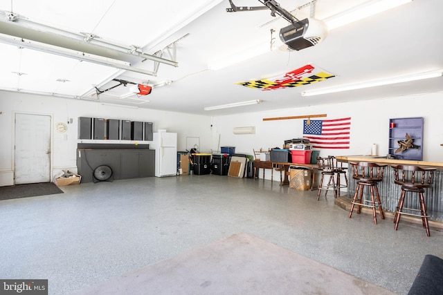 1713 Emerson Ave, Salisbury, MD 21801 - garage with a garage door opener and freestanding refrigerator