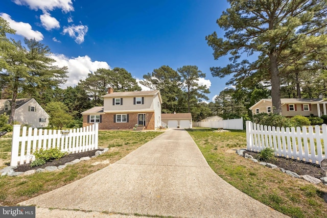 1713 Emerson Ave, Salisbury, MD 21801 - view of front of home featuring a chimney, brick siding, and a garage