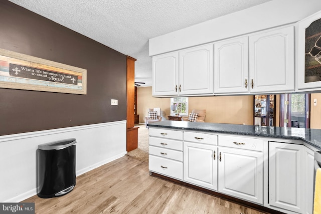 1713 Emerson Ave, Salisbury, MD 21801 - bar with light wood-style flooring, a textured ceiling, and baseboards