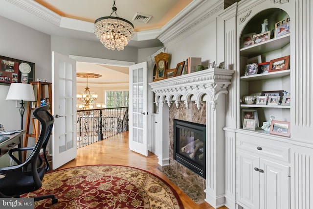 office with ornamental molding, a chandelier, french doors, and visible vents