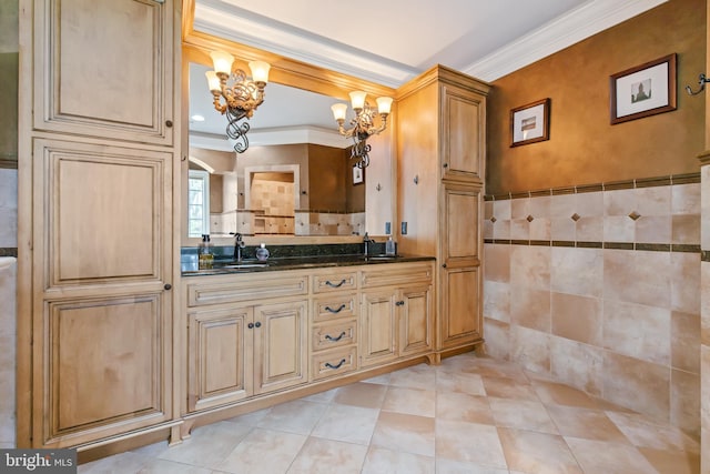 full bath with tile walls, tile patterned floors, an inviting chandelier, and crown molding