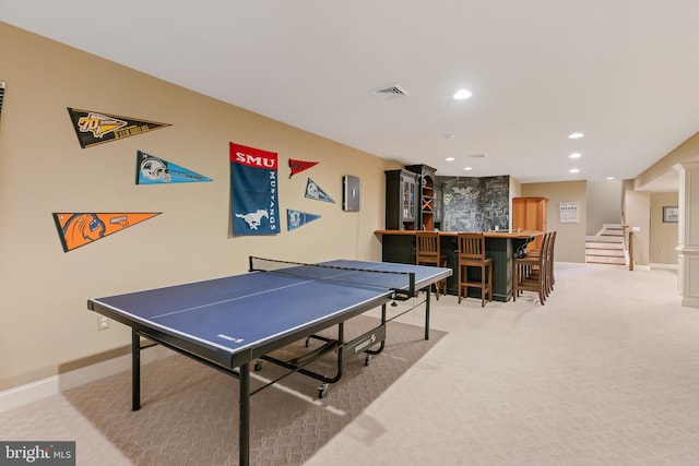 recreation room featuring baseboards, visible vents, light colored carpet, and recessed lighting