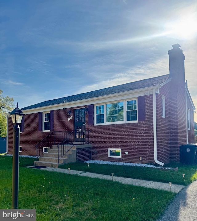 2124 Weber Dr, District Heights, MD 20747 - ranch-style home featuring a chimney, a front lawn, and brick siding