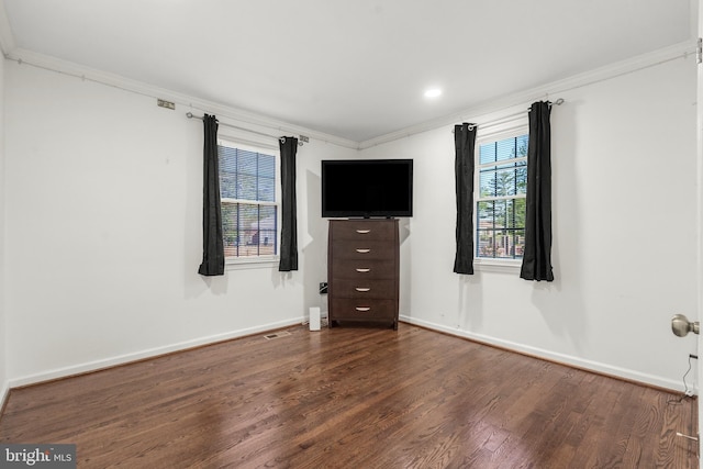 2124 Weber Dr, District Heights, MD 20747 - unfurnished bedroom with baseboards, dark wood-style floors, and crown molding