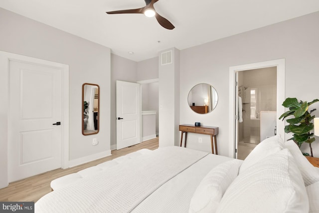 bedroom with visible vents, baseboards, ceiling fan, connected bathroom, and light wood-style flooring