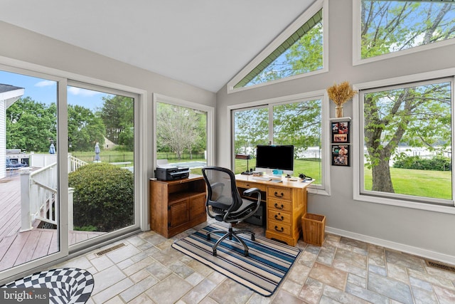 office with baseboards, visible vents, and a healthy amount of sunlight