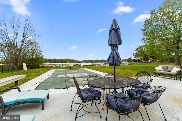 view of patio with outdoor lounge area and fence