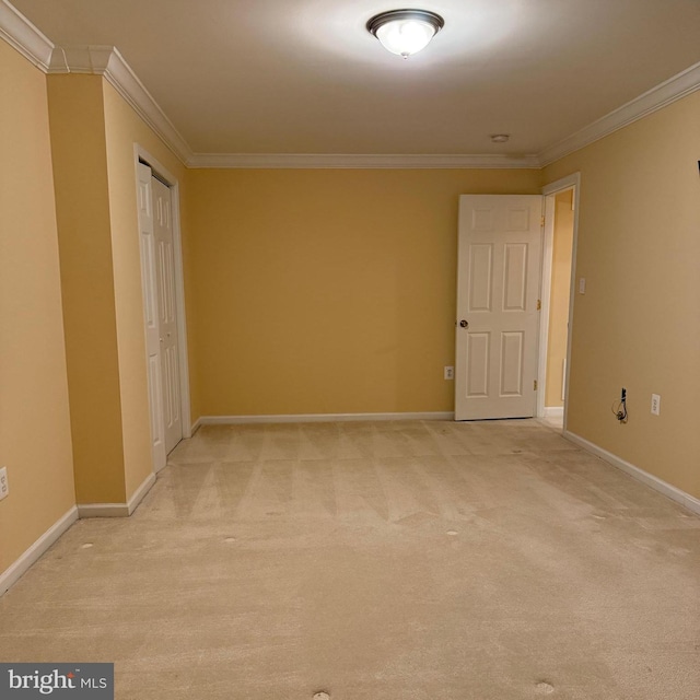 103 Claude Ct SE, Leesburg, VA 20175 - spare room with light carpet, baseboards, and crown molding