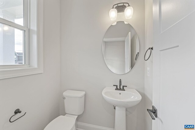 49C Fowler St, Charlottesville, VA 22901 - half bathroom featuring baseboards and toilet