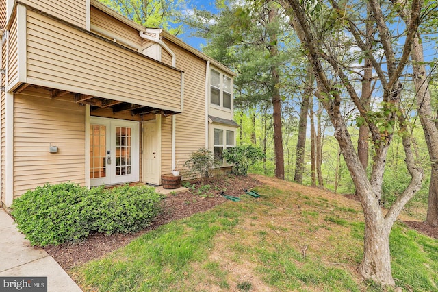 view of yard featuring french doors