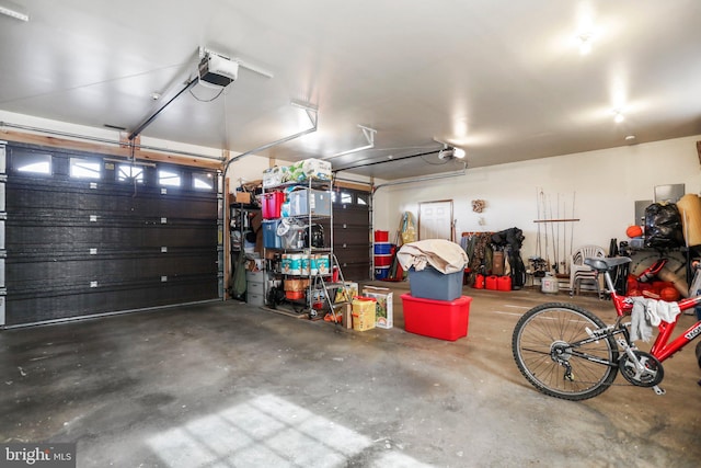 garage featuring a garage door opener
