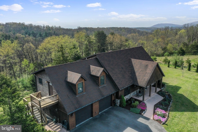 drone / aerial view with a forest view