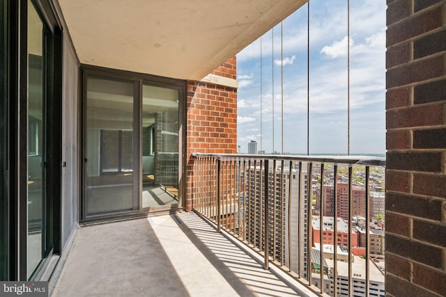 balcony featuring a view of city