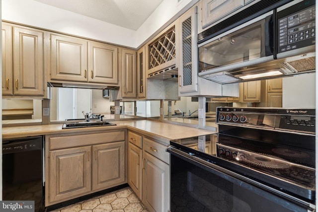 kitchen featuring light tile patterned flooring, a sink, dishwasher, light countertops, and electric stove