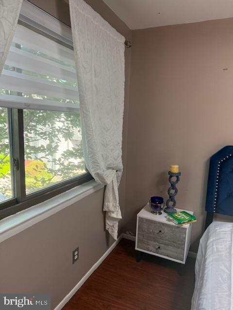 18413 Stone Hollow Dr, Germantown, MD 20874 - bedroom with wood finished floors and baseboards