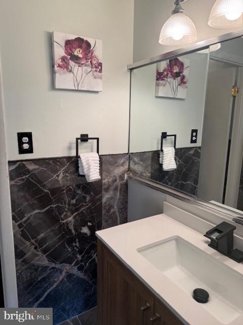 18413 Stone Hollow Dr, Germantown, MD 20874 - bathroom with marble finish flooring and vanity
