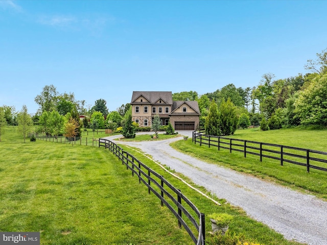 view of front facade with dirt driveway, a front yard, and fence