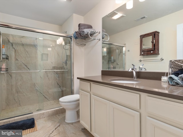 full bathroom featuring toilet, marble finish floor, visible vents, and a marble finish shower