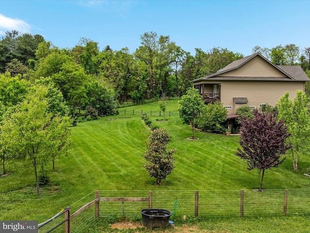 view of yard with fence
