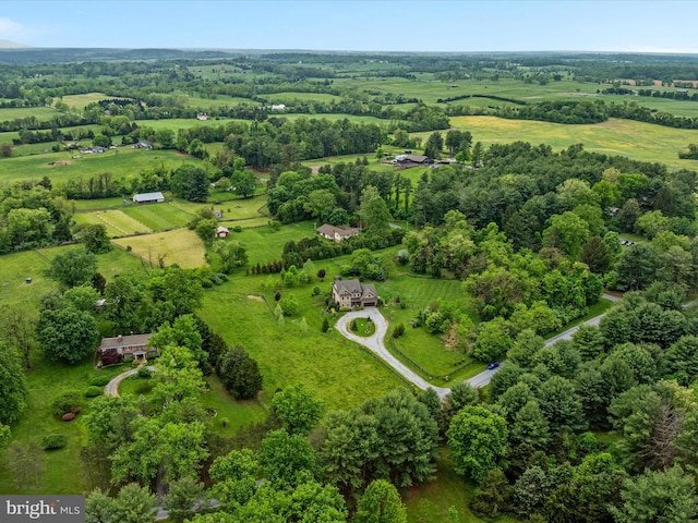 birds eye view of property featuring a rural view