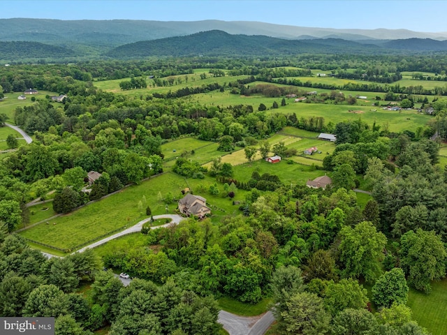 bird's eye view featuring a rural view and a mountain view