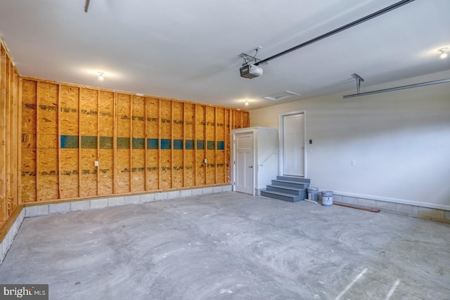 237 Plantation Dr, Felton, DE 19943 - garage featuring a garage door opener